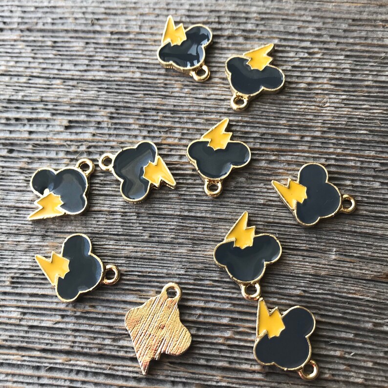 Cute black and orange enamel and gold plated lightning bolt gloomy thunderstorm rain cloud charms pendants sold as a pack of 5