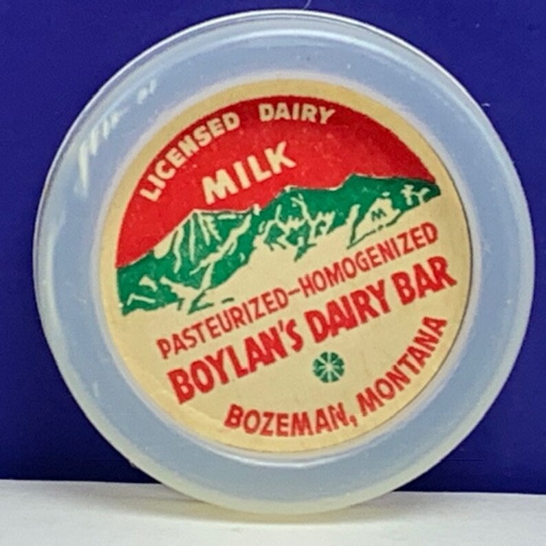 MILK BOTTLE CAP vintage dairy pasteurized farm advertising vtg cow pog 1930s ephemera paper Boylans bar Bozeman Montana Mt mountains usa