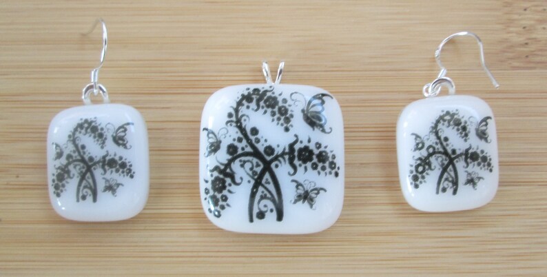 Black enamel on white glass pendant and earrings