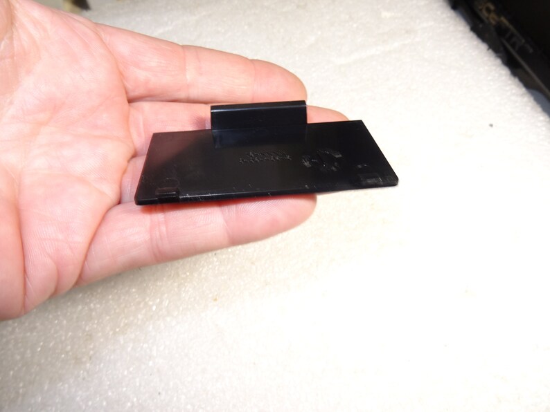 Sega Saturn Model MK-80000A Black Back Battery Cover with 5 Bottom Screws-Good-Clean-Exact one