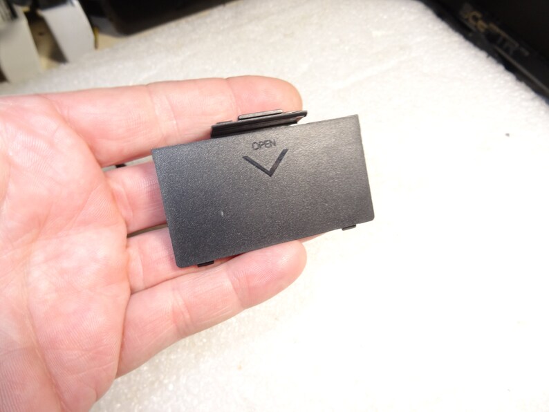 Sega Saturn Model MK-80000A Black Back Battery Cover with 5 Bottom Screws-Good-Clean-Exact one