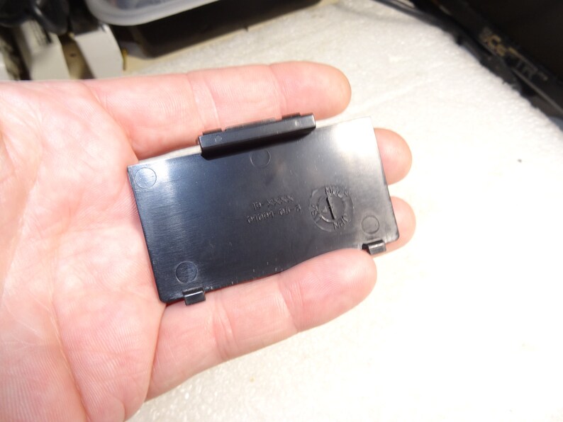 Sega Saturn Model MK-80000A Black Back Battery Cover with 5 Bottom Screws-Good-Clean-Exact one