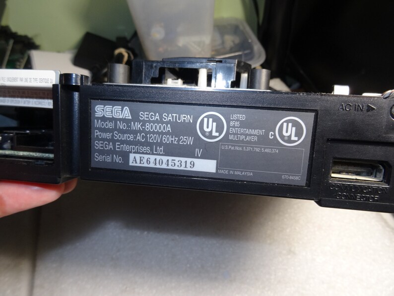 Sega Saturn Model MK-80000A Black Back Battery Cover with 5 Bottom Screws-Good-Clean-Exact one