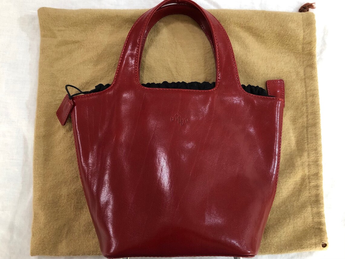 monsac red leather purse